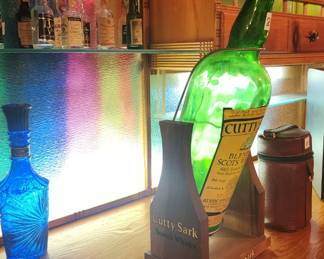 Giant Cutty Sark whiskey bottle in pourer