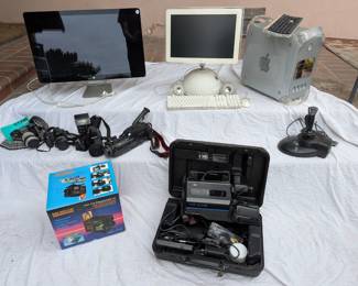 Photography equipment, vintage apple computers and modern display