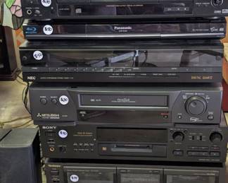 VCR, DVD, Technics tape deck, NEC radio amp, mini disc player and recorder