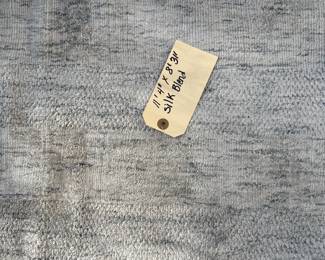 11'4" by 8'3" silk blend rug $400
Spotless