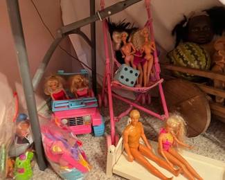 Barbie, stroller and small toys