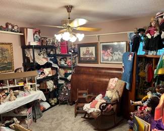 Looking into the doll room, beautiful sleigh bed on back wall