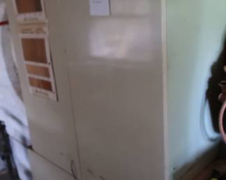 tools inside of cabinets and cabinets are for sale