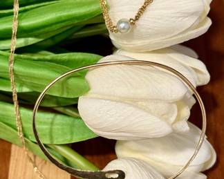 14kt Yellow Gold Bangle Bracelet , 14kt Yellow Gold Chain, and 14kt Yellow Gold Bracelet with an accent Pearl