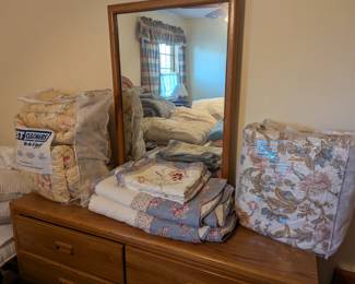 Bed spreads and Comforters. Wooden Drawers & Mirror.