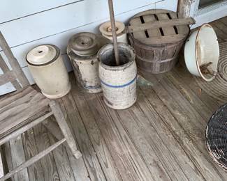 A collection of butter churns