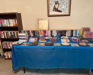 lots of books and unique plates