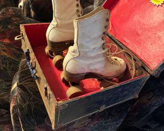 Vintage roller skates with original case