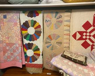 Closet full of handmade quilts. 