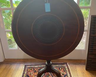 Mahogany inlaid drop top table.