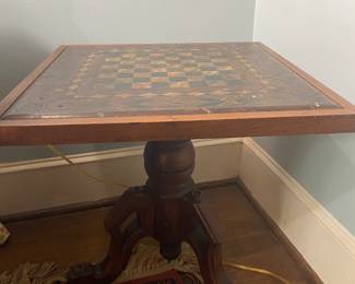 Antique stone top game table.
Made by A.L. Merrill