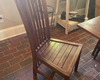 6 teak wood chairs.