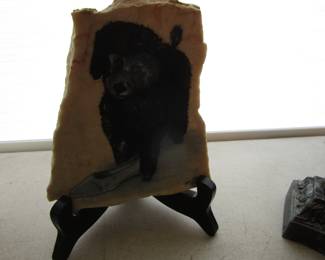Poodle painting on rock
