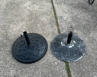 Patio Umbrella Stands , one new and one used 