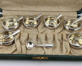 Sterling salt cellars and spoons