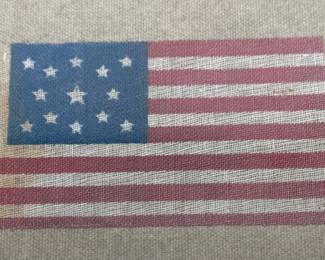 Framed 13 star parade flag circa 1876