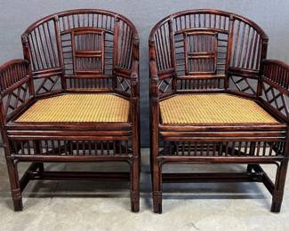 Pair of Rattan armchairs with caned seats and loose seat cushions