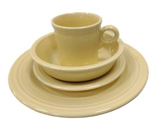YELLOW FIESTA WARE, FOUR PIECES, TWO NEWER AND TWO OLDER MARKS