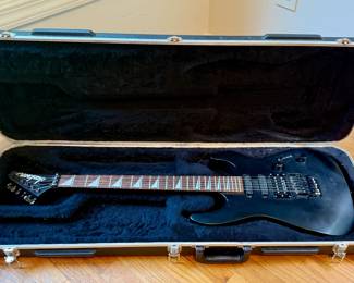 Jackson Soloist electric guitar in case
