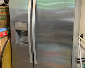 Whirlpool stainless side by side fridge/freezer