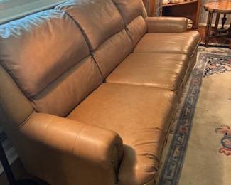Beautiful camel color leather sofa.