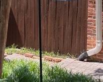 Shepherd's Hooks with hanging lanterns.