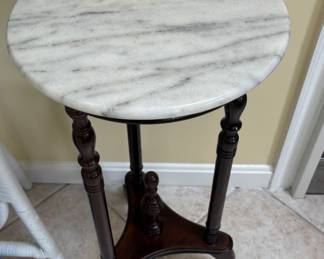 Marble top plant stand.