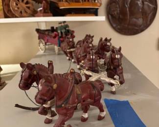 Vintage die-cast horse drawn wagon with 8 horses and 1 coachman.
