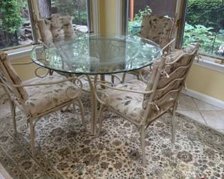 Glass table with matching chairs.