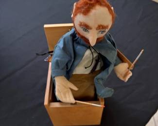 Jack-in-the-box Handmade puppet.