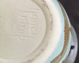 Handmade bowl with handle.