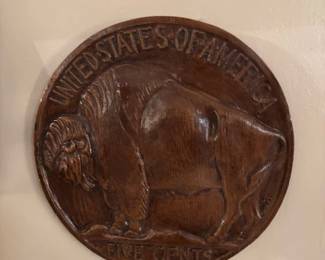 Large decorative wooden nickel.