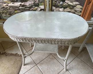 White wicker side table.