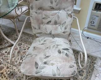 Glass table with matching chairs.