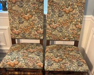 Six floral chairs.