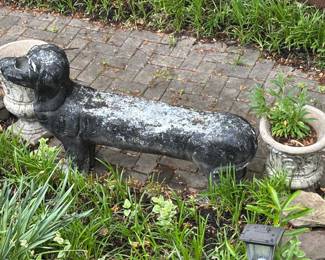 Unique ceramic dog bench.