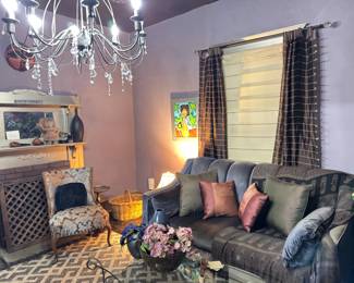 All items are for sale including the sofa, rug, 2 matching antique chairs (professionally reupholstered), metal and glass coffee table, chandelier, curtains, bowls and vases and pillows