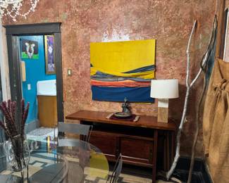 This is another view of the console table with doors. There is also a matching console table without doors. The artwork is original and for sale as well
