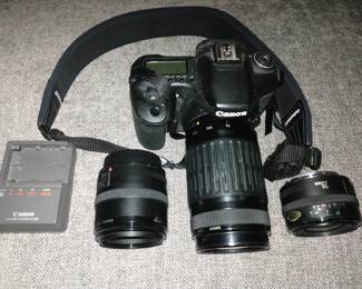 Canon EOS 50D with 3 lenses and battery charger.