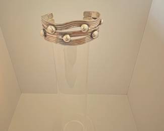 $400 Spratling-example “wave” bracelet - unsigned, perhaps a student or associate.  Sterling, Mexico