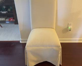 $600.  Six (6) cream upholstered parsons chairs.  Very clean, like new 