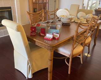 $800 Tommy Bahama dinning table - shown with one leaf in