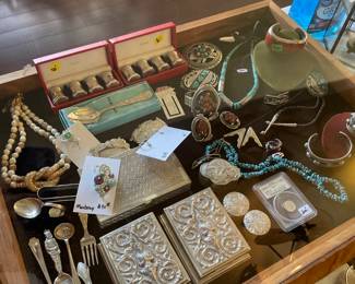 Everything is on display and ready for you to shop for your designer purse, scarf, jewelry, scent, sterling, coins ….