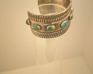 $450.  Very heavy Navajo silver and turquoise cuff
