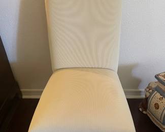 $600.  Six (6) cream upholstered parsons chairs.  Very clean, like new