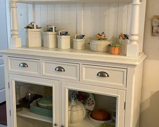 $400. Modern, nicely made cottage style painted cabinet with lined drawers, upper shelf