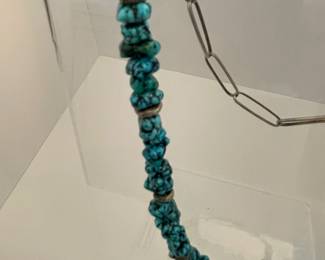 $500. Navajo  Beautiful natural turquoise with silver nuggets included throughout the necklace  