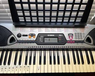 $75.00. Yamaha keyboard with stand and seat EZ-20