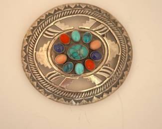 $500.  Navajo spiny oyster belt buckle.  Signed sterling