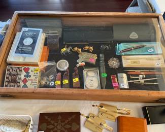 Everything is on display and ready for you to shop for your designer purse, scarf, jewelry, scent, sterling, coins ….